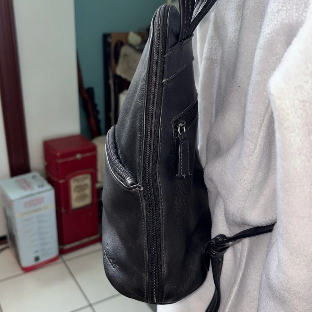 Tignanello backpack  mini backpack leather  black  2 exterior zipper pockets EUC